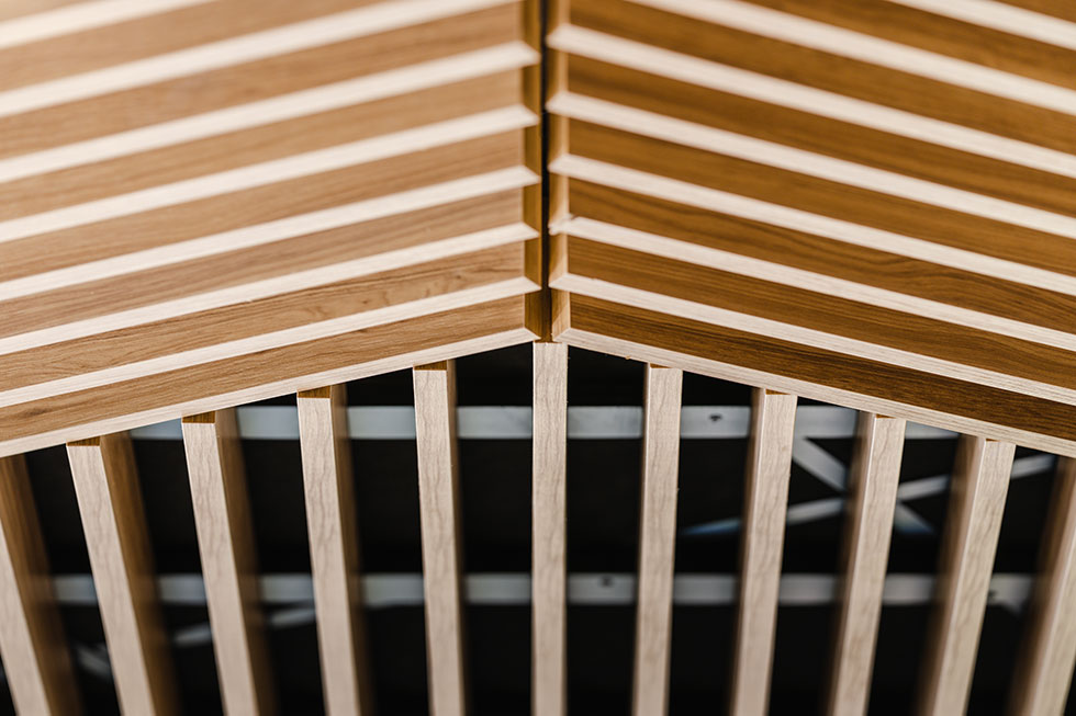 Grille style wood ceiling tiles close up