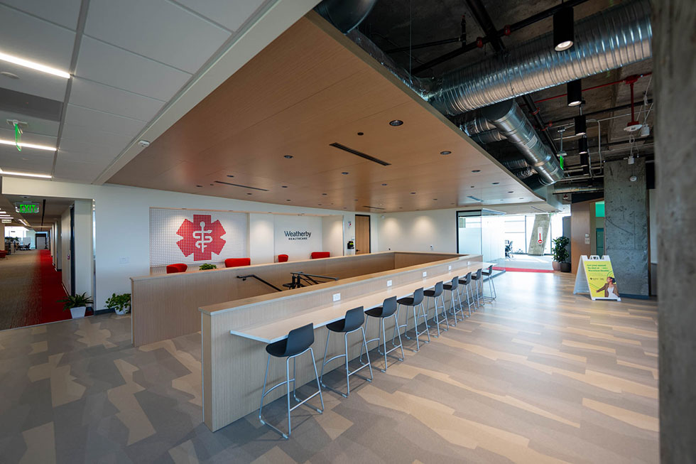 commercial space with panel wood ceiling tiles