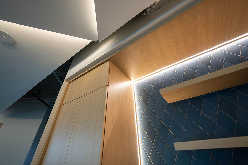 wood ceiling panels next to cabinets