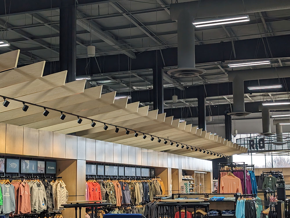 wood panel walls and baffle ceiling in retail space